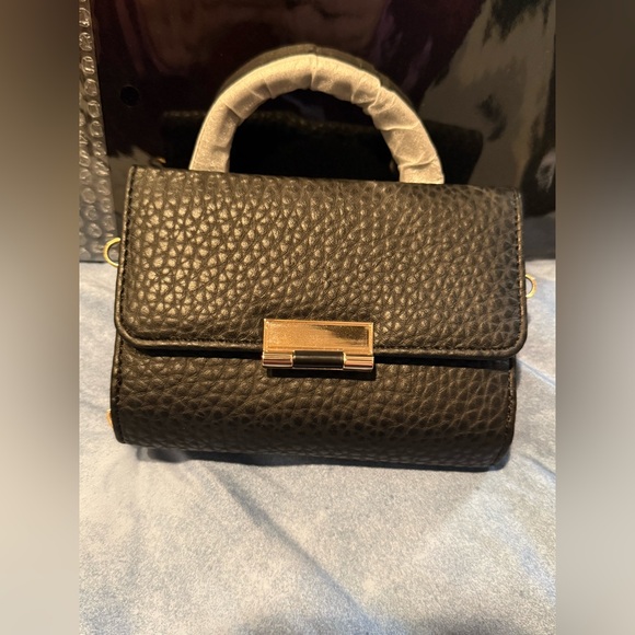 Handbags - New vegan leather black mini top handle bag with a gold tone lock closure